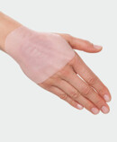 Juzo ScarPad, application on the hand Woman using Juzo ScarPad on the hand